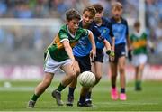 30 July 2023; Shea Henry, Holy Family PS, Magherafelt, Derry, representing Kerry, and Joseph Tarmey, Lismore NS, Waterford, representing Dublin, during the INTO Cumann na mBunscol GAA Respect Exhibition Go Games at the GAA Football All-Ireland Senior Championship final match between Dublin and Kerry at Croke Park in Dublin. Photo by Seb Daly/Sportsfile