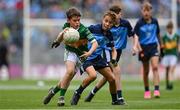 30 July 2023; Shea Henry, Holy Family PS, Magherafelt, Derry, representing Kerry, and Joseph Tarmey, Lismore NS, Waterford, representing Dublin, during the INTO Cumann na mBunscol GAA Respect Exhibition Go Games at the GAA Football All-Ireland Senior Championship final match between Dublin and Kerry at Croke Park in Dublin. Photo by Seb Daly/Sportsfile