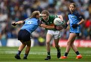 30 July 2023; Caoimhe McMahon, Lissycasey NS, Ennis, Clare, representing Kerry, in action against Freya Coogan, Moneenroe NS, Castlecomer, Kilkenny, representing Dublin, during the INTO Cumann na mBunscol GAA Respect Exhibition Go Games at the GAA Football All-Ireland Senior Championship final match between Dublin and Kerry at Croke Park in Dublin. Photo by Brendan Moran/Sportsfile