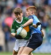 30 July 2023; Rónán McGuinness, Scoil Ursula, Strandhill Road, Sligo, representing Kerry, in action against Zach Healy, Sacred Heart NS, Clondalkin, Dublin, representing Dublin, during the INTO Cumann na mBunscol GAA Respect Exhibition Go Games at the GAA Football All-Ireland Senior Championship final match between Dublin and Kerry at Croke Park in Dublin. Photo by David Fitzgerald/Sportsfile