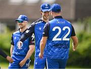 1 August 2023; Leinster Lightning captain George Dockrell, left, congratulates Fionn Hand  after he caught out Mathew Ford of Munster Reds during the Rario Inter-Provincial Trophy 2023 match between Leinster Lightning and Munster Reds at Pembroke Cricket Club in Dublin. Photo by Sam Barnes/Sportsfile