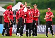 1 August 2023; Munster players celebrate the wicket of Simi Singh of Leinster Lightning during the Rario Inter-Provincial Trophy 2023 match between Leinster Lightning and Munster Reds at Pembroke Cricket Club in Dublin. Photo by Sam Barnes/Sportsfile