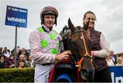 1 August 2023; Jockey Paul Townend with Sharjah and groom Aimee Morrissey after winning the Latin Quarter Beginners Steeplechase during day two of the Galway Races Summer Festival 2023 at Galway Racecourse in Ballybrit, Galway. Photo by David Fitzgerald/Sportsfile
