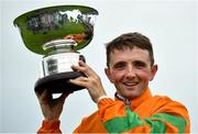 1 August 2023; Jockey Chris Hayes with the trophy after winning the Colm Quinn BMW Mile Handicap during day two of the Galway Races Summer Festival 2023 at Galway Racecourse in Ballybrit, Galway. Photo by David Fitzgerald/Sportsfile