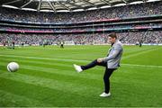 30 July 2023; Former Mayo footballer and RTE analyst Lee Keegan returns a football during the team warmups before the GAA Football All-Ireland Senior Championship final match between Dublin and Kerry at Croke Park in Dublin. Photo by Brendan Moran/Sportsfile