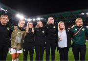31 July 2023; Republic of Ireland players and staff, from left, team doctor Siobhan Forman, Lily Agg, equipment manager Orla Haran, physiotherapist Kim van Wijk, StatSports analyst Niamh McDaid, operations manager Evelyn McMullan and Sophie Whitehouse after the FIFA Women's World Cup 2023 Group B match between Republic of Ireland and Nigeria at Brisbane Stadium in Brisbane, Australia. Photo by Stephen McCarthy/Sportsfile
