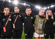 31 July 2023; Republic of Ireland players and staff, from left, video creator Cara Gaynor, masseuse Susie Coffey, team doctor Siobhan Forman, Lily Agg, and equipment manager Orla Haran after the FIFA Women's World Cup 2023 Group B match between Republic of Ireland and Nigeria at Brisbane Stadium in Brisbane, Australia. Photo by Stephen McCarthy/Sportsfile