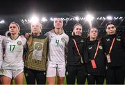 31 July 2023; Republic of Ireland players and staff, from left, Sinead Farrelly, Grace Moloney, Louise Quinn, social media coordinator Emma Clinton, video creator Cara Gaynor and masseuse Susie Coffey after the FIFA Women's World Cup 2023 Group B match between Republic of Ireland and Nigeria at Brisbane Stadium in Brisbane, Australia. Photo by Stephen McCarthy/Sportsfile