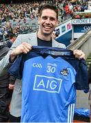 30 July 2023; Former Mayo footballer Lee Keegan and RTÉ tv analyst with a Dublin jersey he was presented with before the GAA Football All-Ireland Senior Championship final match between Dublin and Kerry at Croke Park in Dublin. Photo by Brendan Moran/Sportsfile
