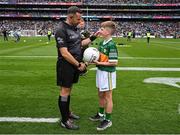 30 July 2023; Joseph Field from Listellick National School in Tralee, Kerry, presents the match ball to referee David Gough before the GAA Football All-Ireland Senior Championship final match between Dublin and Kerry at Croke Park in Dublin. Photo by Brendan Moran/Sportsfile