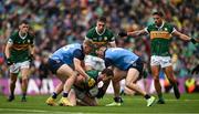 30 July 2023; Tadhg Morley of Kerry is tackled by Cian Murphy, left, and Colm Basquel of Dublin during the GAA Football All-Ireland Senior Championship final match between Dublin and Kerry at Croke Park in Dublin. Photo by Brendan Moran/Sportsfile