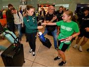 2 August 2023; Katie McCabe is gifted a bracelet at Dublin Airport on the Republic of Ireland's return from the FIFA Women's World Cup 2023 in Australia. Photo by Stephen McCarthy/Sportsfile