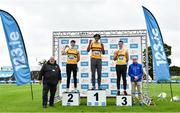 30 July 2023; Men's long jump medallists, Reece Ademola of Leevale AC, Cork, gold, centre, Sam Healy of Leevale AC, Cork, silver, left, and Shane Howard of Bandon AC, Cork, bronze, with Athletics Ireland President John Cronin, far left, and RSA Insurance Ireland Chief Executive Officer Kevin Thompson, far right, during day two of the 123.ie National Senior Outdoor Championships at Morton Stadium in Dublin. Photo by Sam Barnes/Sportsfile