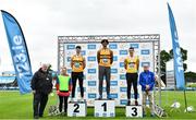 30 July 2023; Men's long jump medallists, Reece Ademola of Leevale AC, Cork, gold, centre, Sam Healy of Leevale AC, Cork, silver, left, and Shane Howard of Bandon AC, Cork, bronze, with Athletics Ireland President John Cronin, far left, and RSA Insurance Ireland Chief Executive Officer Kevin Thompson, far right, during day two of the 123.ie National Senior Outdoor Championships at Morton Stadium in Dublin. Photo by Sam Barnes/Sportsfile