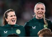 31 July 2023; Republic of Ireland players Niamh Fahey and Louise Quinn sing Amhrán na bhFiann before the FIFA Women's World Cup 2023 Group B match between Republic of Ireland and Nigeria at Brisbane Stadium in Brisbane, Australia. Photo by Stephen McCarthy/Sportsfile