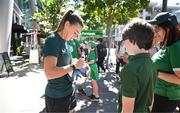 31 July 2023; Katie McCabe of Republic of Ireland signs an autograph for a young supporter during a team walk before the FIFA Women's World Cup 2023 Group B match between Republic of Ireland and Nigeria at Brisbane Stadium in Brisbane, Australia. Photo by Stephen McCarthy/Sportsfile
