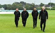 2 August 2023; Officials, from left, umpire Jareth McCready, match referee Phil Thompson, third umpire Gareth Morrison and umpire Jonathan Kennedy conduct a pitch inspection before abandoning the Rario Inter-Provincial Trophy 2023 match between Leinster Lightning and North West Warriors at Pembroke Cricket Club in Dublin. Photo by Sam Barnes/Sportsfile