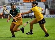 28 July 2023; Aine Cunningham of Australasia in action against Aine Barry of Middle East during the Camogie Open Final Mary Gavin Cup match on day five of the FRS Recruitment GAA World Games 2023 at Celtic Park in Derry. Photo by Piaras Ó Mídheach/Sportsfile