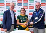 28 July 2023; Meg Farrell of Australasia is presented with the Best and Fairest Award by Niall Erskine, Chairman of World GAA Council Committee, and General Manager of FRS Recruitment Colin Donnery, left, after during the Camogie Open Final Mary Gavin Cup match between Australasia and Middle East on day five of the FRS Recruitment GAA World Games 2023 at Celtic Park in Derry. Photo by Piaras Ó Mídheach/Sportsfile