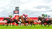 2 August 2023; Ninth Loch, 3, with Jody Townend up, and Votre Homme, 18, with Finny Maguire up, pass the finishing post during the Tote.ie Never Beaten By SP Maiden during day three of the Galway Races Summer Festival at Ballybrit Racecourse in Galway. Photo by Seb Daly/Sportsfile
