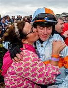 2 August 2023; Jockey Danny Gilligan is congratulated by his mother Natalie after winning the Tote Galway Plate on Ash Tree Meadow during day three of the Galway Races Summer Festival at Ballybrit Racecourse in Galway. Photo by Seb Daly/Sportsfile