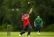3 August 2023; Peter Moor of Munster Reds hits a four during the Rario Inter-Provincial Trophy 2023 match between North West Warriors and Munster Reds at Pembroke Cricket Club in Dublin. Photo by Sam Barnes/Sportsfile