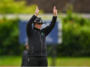 3 August 2023; Umpire Steven Wood signals a six during the Rario Inter-Provincial Trophy 2023 match between North West Warriors and Munster Reds at Pembroke Cricket Club in Dublin. Photo by Sam Barnes/Sportsfile