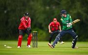 3 August 2023; Scott Macbeth of North West Warriors bats watched by Munster wicketkeeper Peter Moor during the Rario Inter-Provincial Trophy 2023 match between North West Warriors and Munster Reds at Pembroke Cricket Club in Dublin. Photo by Sam Barnes/Sportsfile