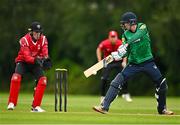 3 August 2023; Scott Macbeth of North West Warriors bats watched by Munster wicketkeeper Peter Moor during the Rario Inter-Provincial Trophy 2023 match between North West Warriors and Munster Reds at Pembroke Cricket Club in Dublin. Photo by Sam Barnes/Sportsfile