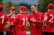 3 August 2023; Ben White of Munster Reds, centre, celebrates a wicket with team-mates during the Rario Inter-Provincial Trophy 2023 match between North West Warriors and Munster Reds at Pembroke Cricket Club in Dublin. Photo by Sam Barnes/Sportsfile