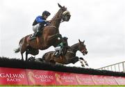 3 August 2023; The Big Doyen, with Kevin Sexton up, jumps the first on their way to winning the Guinness Novice Hurdle during day four of the Galway Races Summer Festival at Ballybrit Racecourse in Galway. Photo by Seb Daly/Sportsfile