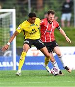 3 August 2023; Cameron McJannet of Derry City in action against Tete Yengiof KuPS during the UEFA Europa Conference League Second Qualifying Round Second Leg match between KuPS and Derry City at the Väre Areena in Kuopio, Finland. Photo by Jussi Eskola/Sportsfile
