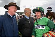 3 August 2023; Trainer Willie Mullins, left, owner Simon Munir, centre, and jockey Paul Townend celebrate after sending out Zarak The Brave to win the Guinness Galway Hurdle Handicap during day four of the Galway Races Summer Festival at Ballybrit Racecourse in Galway. Photo by Seb Daly/Sportsfile