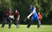 3 August 2023; Lorcan Tucker of Leinster Lightning bats watched by Northern Knights wicketkeeper Neil Rock during the Rario Inter-Provincial Trophy 2023 match between Leinster Lightning and Northern Knights at Pembroke Cricket Club in Dublin. Photo by Sam Barnes/Sportsfile