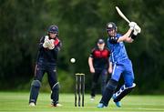 3 August 2023; George Dockrell of Leinster Lightning bats watched by Northern Knights wicketkeeper Neil Rock during the Rario Inter-Provincial Trophy 2023 match between Leinster Lightning and Northern Knights at Pembroke Cricket Club in Dublin. Photo by Sam Barnes/Sportsfile