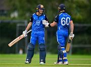 3 August 2023; Tim Tector of Leinster Lightning, left, and team-mate George Dockrell celebrate after winning the Rario Inter-Provincial Trophy 2023 match between Leinster Lightning and Northern Knights at Pembroke Cricket Club in Dublin. Photo by Sam Barnes/Sportsfile