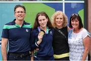 3 August 2023; Roisin Ni Riain of Ireland with family members from left: Dad; Seosamh O Riain, Mum; Marian Conroy, and Aunt; Aine Ni Riain, after winning Gold in the Women's 100m Backstroke S13 Final during day four of the World Para Swimming Championships 2023 at Manchester Aquatics Centre in Manchester. Photo by Paul Greenwood/Sportsfile