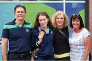 3 August 2023; Roisin Ni Riain of Ireland with family members from left: Dad; Seosamh O Riain, Mum; Marian Conroy, and Aunt; Aine Ni Riain, after winning Gold in the Women's 100m Backstroke S13 Final during day four of the World Para Swimming Championships 2023 at Manchester Aquatics Centre in Manchester. Photo by Paul Greenwood/Sportsfile
