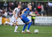 3 August 2023; Ásgeir Sigurgeirsson of KA in action against Paul Doyle of Dundalk during the UEFA Europa Conference League Second Qualifying Round Second Leg match between Dundalk and KA at Oriel Park in Dundalk, Louth. Photo by Ben McShane/Sportsfile