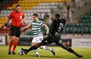3 August 2023; Liam Burt of Shamrock Rovers in action against Anderson Esiti of Ferencvaros during the UEFA Europa Conference League Second Qualifying Round Second Leg match between Shamrock Rovers and Ferencvaros at Tallaght Stadium in Dublin. Photo by Harry Murphy/Sportsfile