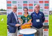 28 July 2023; Maud Annie Foley of Australasia is presented with the Best and Fairest Award by General Manager of FRS Recruitment Colin Donnery, left, and Niall Erskine, Chairman of World GAA Council Committee, after the LGFA Open Cup Final Rachel Kenneally Cup match between Australasia and Parnells on day five of the FRS Recruitment GAA World Games 2023 at Celtic Park in Derry. Photo by Piaras Ó Mídheach/Sportsfile