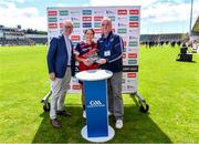 28 July 2023; Merrit Brown of South East is presented with the Best and Fairest Award by General Manager of FRS Recruitment Colin Donnery, left, and Niall Erskine, Chairman of World GAA Council Committee, after the Camogie International Cup Final Etty Kelly Cup match between South East and Coastal Virginia on day five of the FRS Recruitment GAA World Games 2023 at Celtic Park in Derry. Photo by Piaras Ó Mídheach/Sportsfile