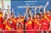 28 July 2023; Gasconha celebrate with the trophy after the Men's Football International Division 2 Cup Final Sperrins Cup match between Gasconha and Siroc on day five of the FRS Recruitment GAA World Games 2023 at Celtic Park in Derry. Photo by Piaras Ó Mídheach/Sportsfile