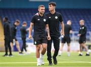 4 August 2023; Kerry FC players Leo Gaxha, left, and Martin Coughlan, right, walk the pitch before the SSE Airtricity Men's First Division match between Waterford and Kerry at RSC in Waterford. Photo by Michael P Ryan/Sportsfile