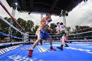 4 August 2023; Conor Quinn, right, and Bryan Castro during their super-flyweight bout during the Féile Fight Night at Falls Park in Belfast. Photo by Ramsey Cardy/Sportsfile