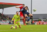 4 August 2023; Conor Carty of St Patrick's Athletic in action against Garry Buckley of Sligo Rovers, centre, and Luke McNicholas during the SSE Airtricity Men's Premier Division match between Sligo Rovers and St Patrick's Athletic at The Showgrounds in Sligo. Photo by Tyler Miller/Sportsfile