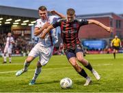 4 August 2023; Bartlomiej Kukulowwicz of Bohemians in action against Dayle Rooney of Drogheda United during the SSE Airtricity Men's Premier Division match between Bohemians and Drogheda United at Dalymount Park in Dublin. Photo by John Sheridan/Sportsfile