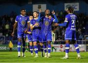 4 August 2023; Roland Idowu of Waterford, second from right, celebrates after scoring his side's second goal with teammates during the SSE Airtricity Men's First Division match between Waterford and Kerry at RSC in Waterford. Photo by Michael P Ryan/Sportsfile