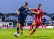 4 August 2023; Tommy Lonergan of St Patrick's Athletic in action against Stefan Radosavljevic of Sligo Rovers during the SSE Airtricity Men's Premier Division match between Sligo Rovers and St Patrick's Athletic at The Showgrounds in Sligo. Photo by Tyler Miller/Sportsfile