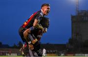4 August 2023; Jonathan Afolabi of Bohemians, right, celebrates with teammate Danny Grant after scoring their side's third goal during the SSE Airtricity Men's Premier Division match between Bohemians and Drogheda United at Dalymount Park in Dublin. Photo by Seb Daly/Sportsfile